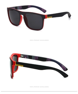 Detail view of black and red polarized sport sunglasses with camo pattern and text