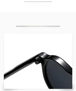 Close-up of reinforced metal hinges on high-quality oversized black sunglasses frames