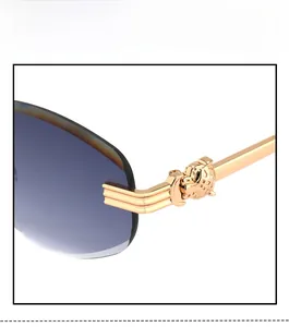 Macro detail of golden panther head embellishment on luxury rimless sunglasses