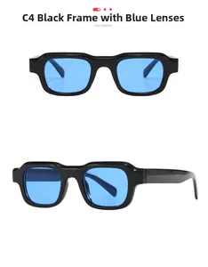 Detail view of vintage square sunglasses featuring a sleek black frame and blue lenses