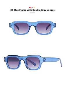 Close-up of square retro sunglasses with transparent blue frame and grey gradient lenses