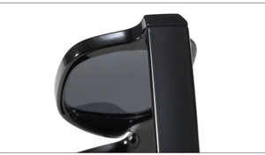 Detailed close-up of wide temple hinge on black vintage square sunglasses frames