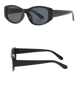 Side and front view of retro square cat-eye sunglasses with thick black frames