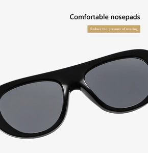 Detail view of integrated nose pads on black pilot sunglasses for comfortable pressure-free wear