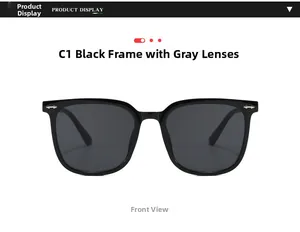 Front view of black oversized sunglasses with silver arrow studs and grey lenses