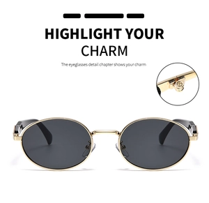 Détail de lunettes de soleil ovales avec monture en métal doré et charnière précise