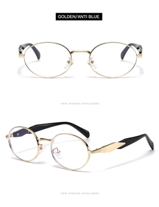 Détail de lunettes ovales en métal doré avec verres anti-lumière bleue et branches noires