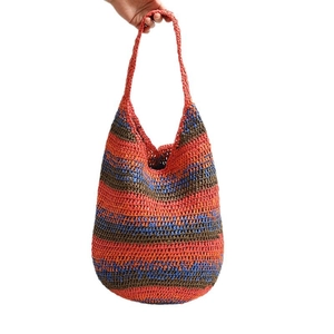Colorful striped handmade straw tote bag for beach vacations with bohemian style shoulder straps
