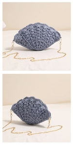 Detail of light blue shell-shaped woven bag with scallop texture and gold chain strap