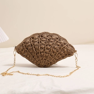Handmade brown shell-shaped straw crossbody bag with golden chain for beach vacation