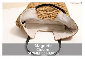 Detailansicht einer Strohtasche mit Magnetverschluss und Innenfutter aus Leinenstoff