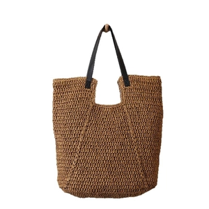 Große Strohtasche mit schwarzen Ledergriffen für Strandurlaub und tägliches Pendeln