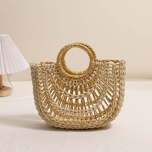 Chic hollow semi-circle straw tote bag with round handles for beach vacations