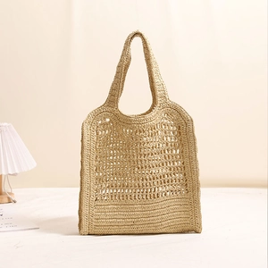 Chic hollow out straw shoulder bag with letter embroidery for beach and seaside vacations