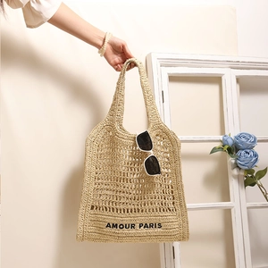 Woven straw tote bag with AMOUR PARIS embroidery for beach holidays and summer vacation