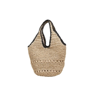 Large hollowed-out straw shoulder bag with black trim and wave pattern for beach vacation
