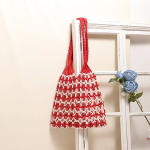 Handmade red and white cotton rope macrame tote bag with bohemian woven mesh design