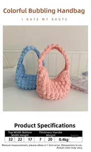 Detail view of woven handbag showing dot texture and 0.4kg lightweight material