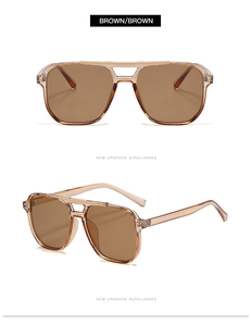 Vue détaillée de lunettes de soleil aviateur marron translucide avec double pont frontal