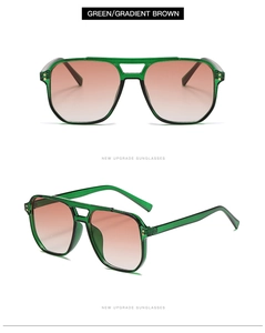 Détail de lunettes aviateur vertes transparentes avec verres dégradés marron et double pont