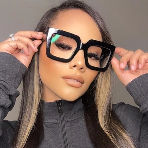 Modern oversized square blue light blocking glasses with thick black frames for women