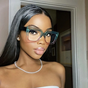 Close-up of stylish gradient square frame blue light glasses on model in a home setting