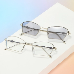 Geometric silver metal polygonal sunglasses with clear and light grey tinted lenses