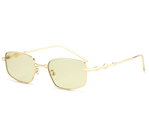 Detail view of gold metal sunglasses frame with green lenses and geometric temple decor