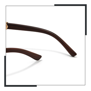 Detail of dark brown wood-grain temple arm with golden hinge on stylish sunglasses