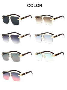 Detail view of square rimless sunglasses with gradient lenses and wood grain temples
