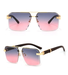 Detail of square oversized sunglasses with gradient lenses and wood grain temples