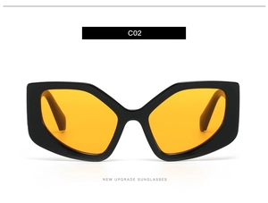 Detail of geometric square sunglasses with black glossy frame and orange lenses