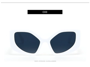 Front view of white geometric cat eye sunglasses with grey lenses and thick frame