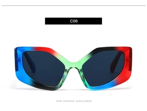Detailed view of colorful geometric polygon frame sunglasses with gradient translucent finish