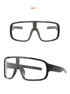 Detail view of large black frame cycling glasses with clear anti-fog lenses for sports