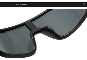 Detail view of anti-fog cycling glasses featuring integrated nose pads and a black frame
