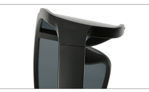 Macro view of matte black cycling glasses hinge and durable frame connection