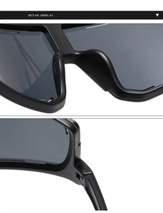 Detail display of black sports sunglasses with matte frames and integrated nose pads