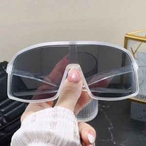 Detail of oversized matte frame sunglasses with dark lenses and durable sport design