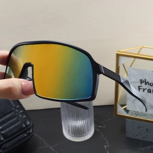 Detail of gradient mercury lens cycling sunglasses with matte black frames and anti-slip temples
