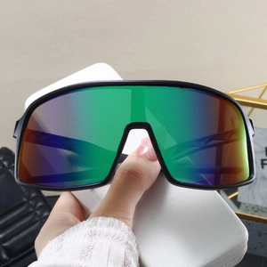 Detail of oversized matte black sports sunglasses with gradient mirror lenses