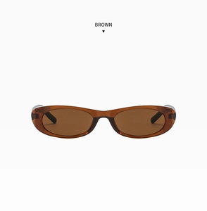 Front view of oval sunglasses with translucent brown frames and matching brown lenses