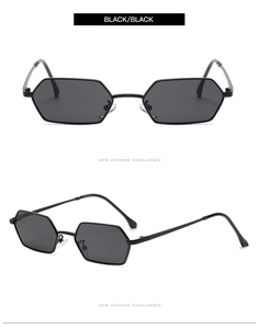 Detail view of black polygon metal sunglasses with dark polarized lenses and sleek frames