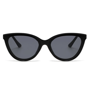 Classic black cat-eye sunglasses with dark grey lenses in a retro oversized fashion style
