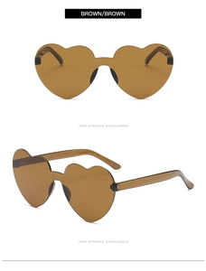 Close-up of brown heart-shaped rimless sunglasses showing front and side profile views
