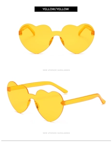 Front and side view of rimless heart-shaped sunglasses in vibrant yellow color