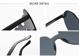 Detailed close-up of rimless flame heart sunglasses hinge, nose pads, and sleek black temples