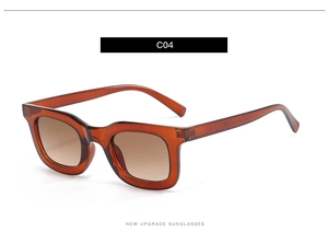 Vue latérale de lunettes de soleil carrées marron translucide avec branches épaisses