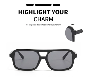 Detail view of durable metal hinges and double-bridge frame of black pilot sunglasses