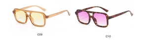 Detail view of double bridge sunglasses in amber and tortoiseshell retro frames
